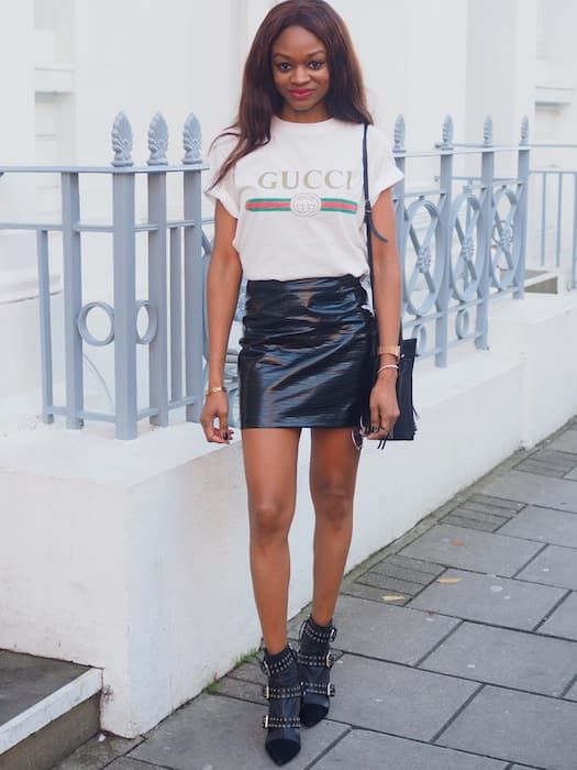 a T-shirt with a leather skirt
