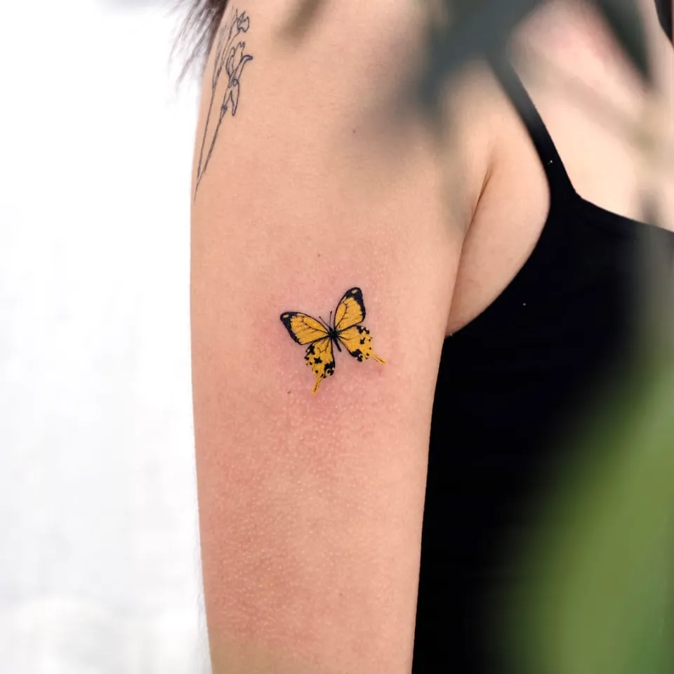 yellow butterfly tattoo meaning