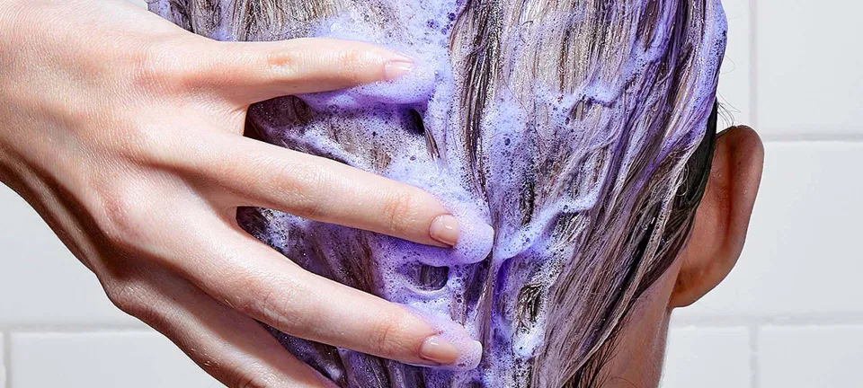 how to remove purple shampoo stain from hair